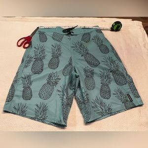 Airwalk light blue pineapple design used board shorts size M